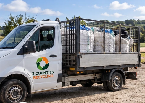 3 Counties Recycling cage vehicle carrying tonne bags of material